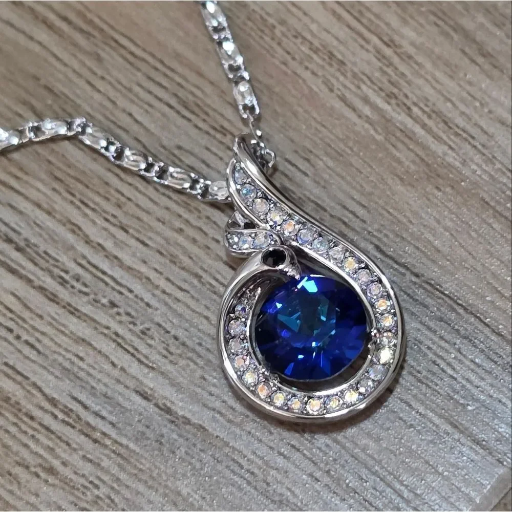🩵⏭️NIB White Gold Plated Blue Crystal Sapphire Phoenix Pendant Necklace